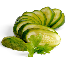 Image showing Slices of Pickled cucumbers with parsley 