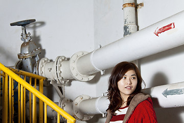 Image showing Asian girl in a factory