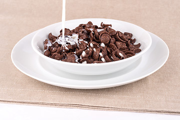 Image showing Chocolate cereal with milk.