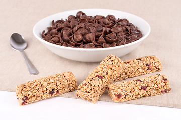 Image showing Chocolate cereals and bars with fruits.