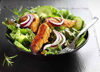 Image showing Salad with marinated chicken breast stripes 