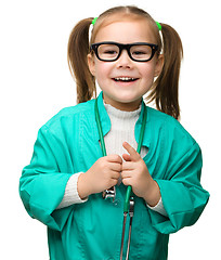 Image showing Cute little girl is playing doctor