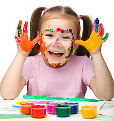 Image showing Cheerful girl with painted hands