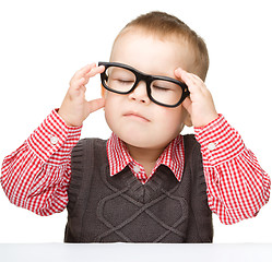 Image showing Portrait of a cute little boy wearing glasses