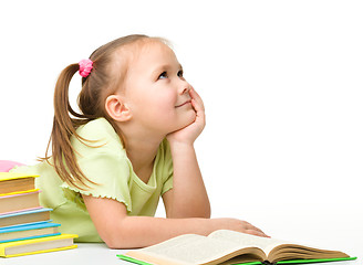 Image showing Cute little girl with books