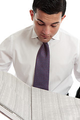 Image showing Investor or Stockbroker reading sharemarket