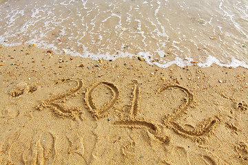 Image showing 2012 handwritting on sand