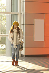 Image showing Asian stylish girl in train station walking