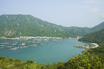 Image showing Fishing village from hill top at day 