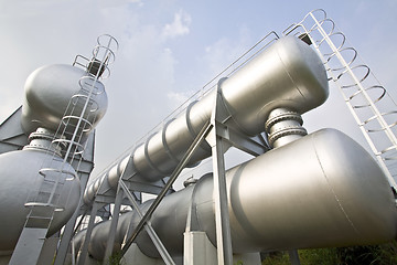 Image showing Industrial machines, pipes, tubes, machinery and steam turbine i