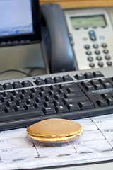 Image showing Office breakfast with office tools