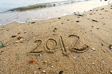 Image showing 2012 year written on the beach sand