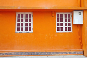 Image showing Vintage wall and windows in orange background