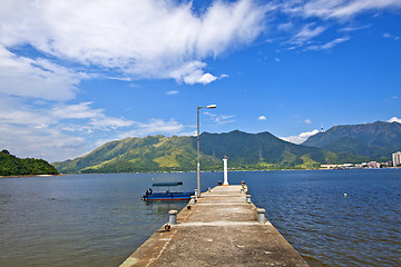 Image showing Isolated pier under blue sky