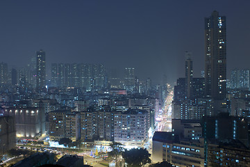 Image showing Hong Kong downtown at night with highrise buildings