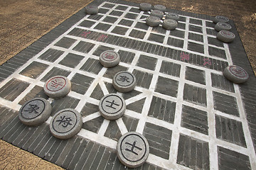 Image showing Chinese chess on the ground