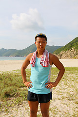 Image showing Young sports man outdoor, ready for hiking.