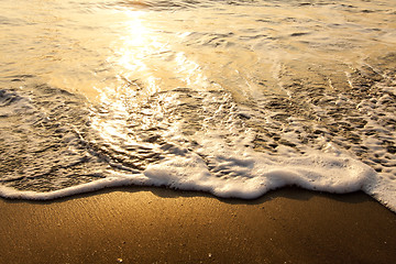 Image showing Wave under sunset for background use