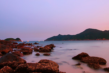 Image showing Sunset along the coast under long exposure