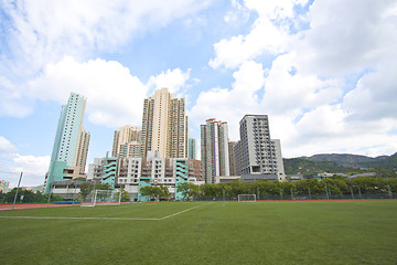 Image showing Hong Kong downtown with residential buildings and sports court