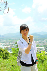 Image showing Asian girl hiking in countryside 
