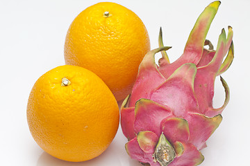 Image showing Dragon fruit and oranges