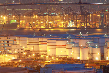 Image showing Oil tanks at night in container terminal 