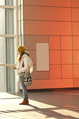 Image showing Asian girl in train station waiting someone