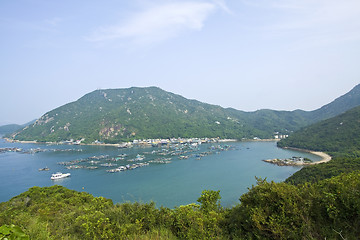 Image showing Fishing village from hill top at day 