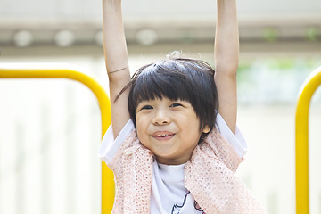 Image showing Asian girl playing in park