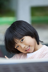 Image showing Asian young girl smiling