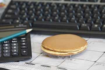 Image showing Office breakfast with finance concept tools