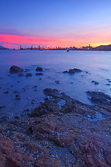 Image showing Sunset along the coast, long exposure of rocks