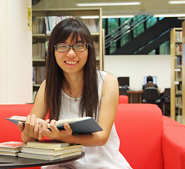 Image showing Asian girl student in library