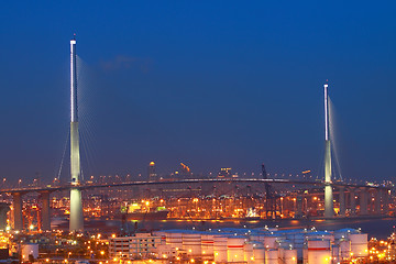 Image showing Stonecutters Bridge in Hong Kong with oil tanks