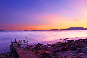 Image showing Sunset along the coast under long exposure