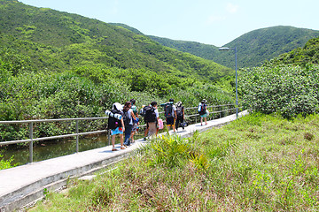 Image showing Asian hiking team in mountains of Hong Kong