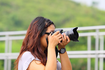 Image showing Female photographer