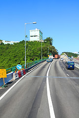 Image showing Highway in Hong Kong at day with moving cars