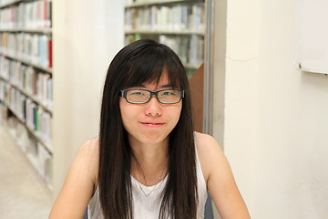 Image showing Asian girl student in library