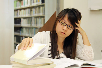 Image showing Asian girl student in library