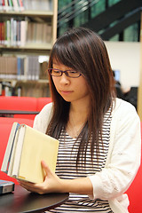 Image showing Asian girl student in library