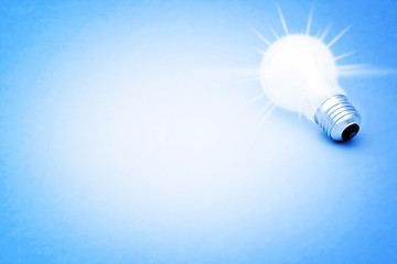 Image showing Background with lit lightbulb