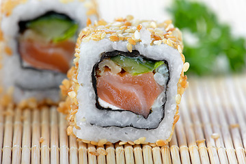 Image showing sushi with salmon and cucumber