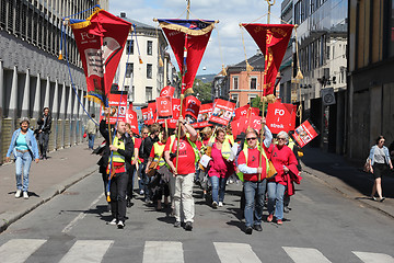 Image showing Marching strikers