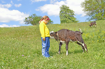 Image showing The Child and calf