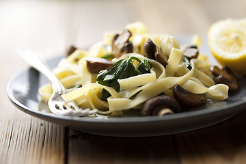 Image showing tagliatelles with spinach and mushrooms
