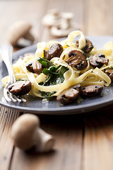 Image showing tagliatelles with spinach and mushrooms