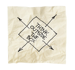 Image showing think outside the box on a napkin