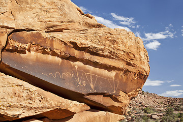 Image showing ancient rock art with snake 